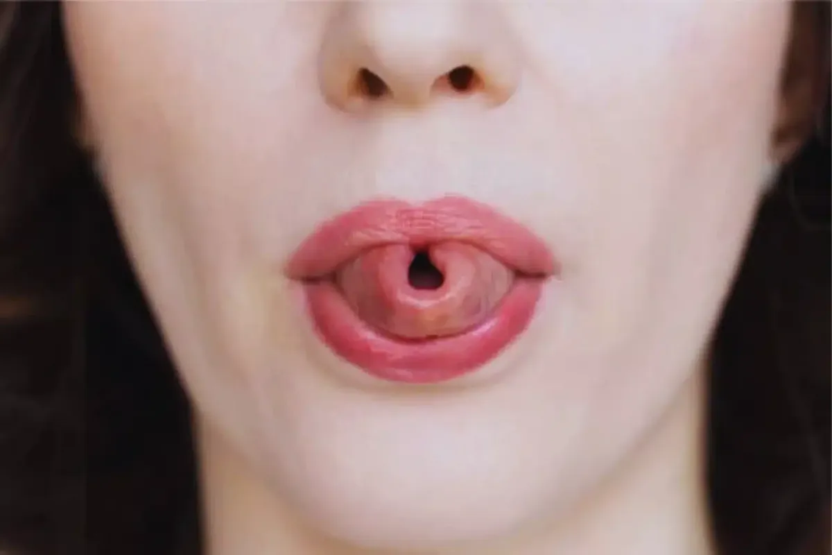 O que significa curvar a língua e o que isso pode dizer sobr